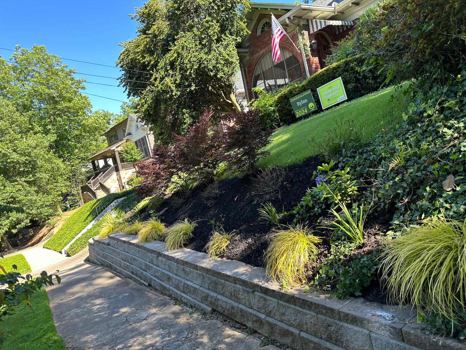 Sloped Front Yard with Tiered Hardscape