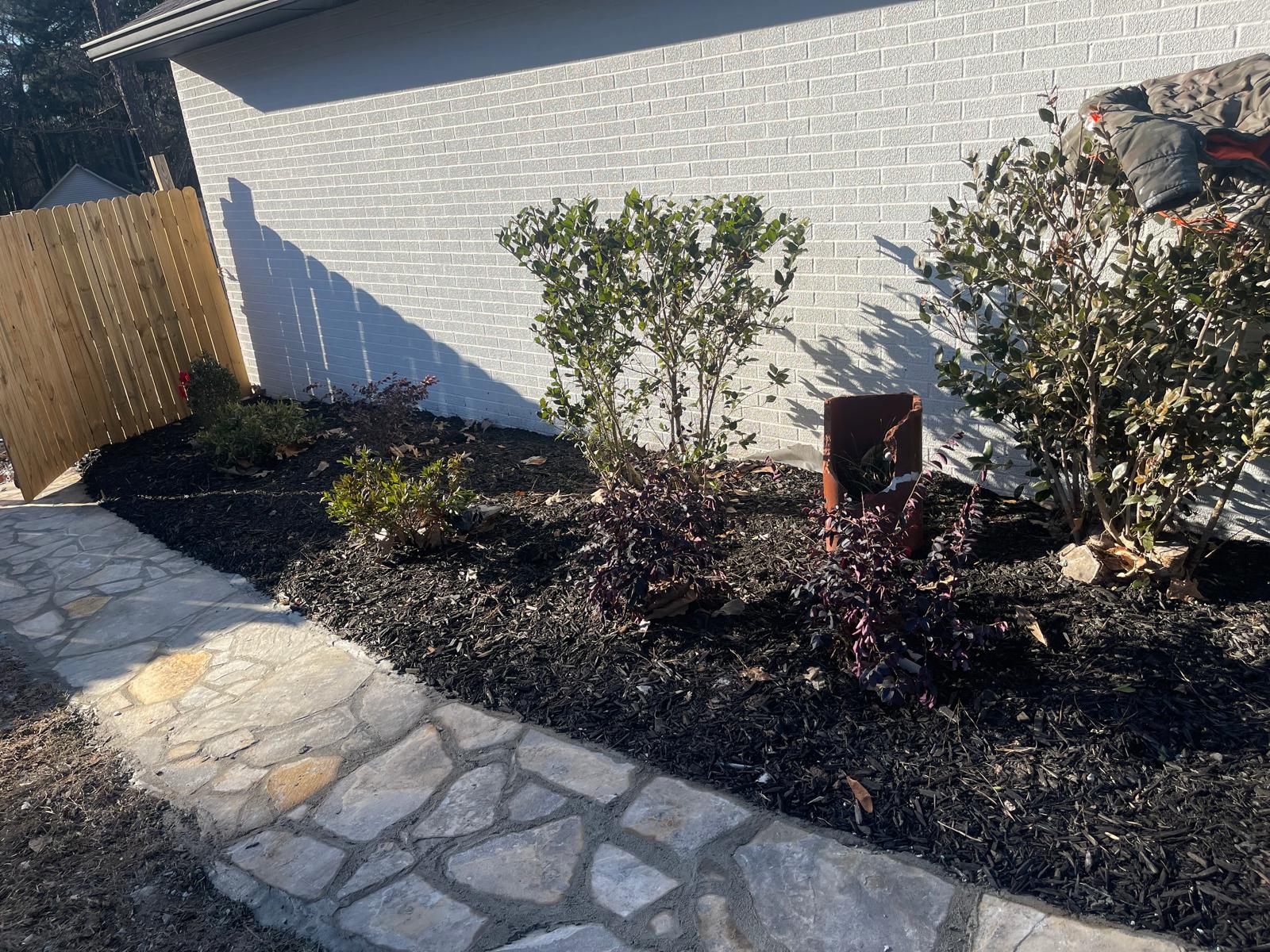 Side Yard Stone Patio with Plantings